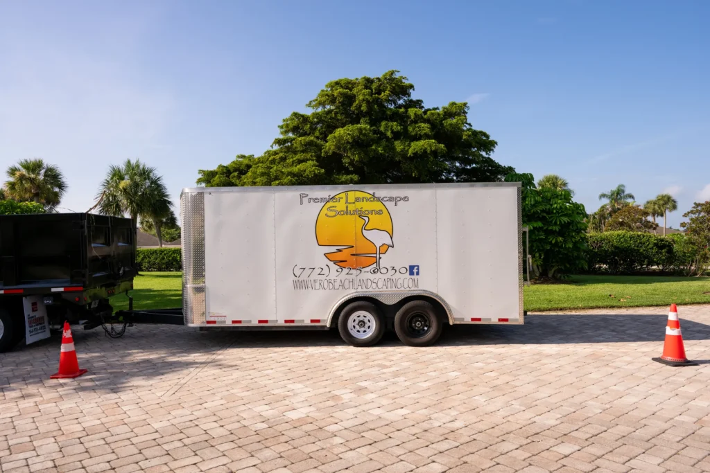 Premier branded trailer parked at a property