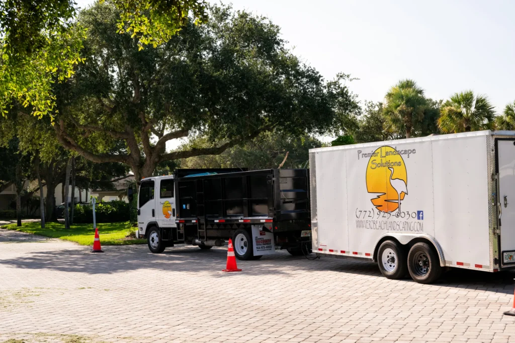Premier truck and branded equipment trailer on site